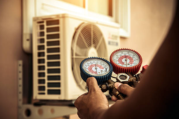 Professional Air Conditioning Service technician working in La Grange Park, IL